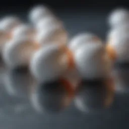Close-up of oxycodone tablets on a reflective surface.