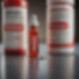 Close-up of a Tylenol bottle beside a Pfizer booster vial
