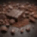 A close-up of dark chocolate pieces with cocoa beans