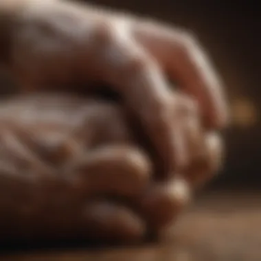 A close-up of a dog's paw being held gently by a caregiver