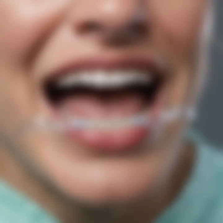 Close-up of a dental dam on a tooth during treatment